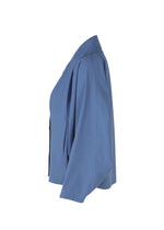 A detail shot of the 132 5. ISSEY MIYAKE WASHI STRETCH jacket.