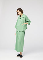A model wears the 132 5. ISSEY MIYAKE 132 5. FLAT 2 132-5-flat-2-jacket-olive-green.
