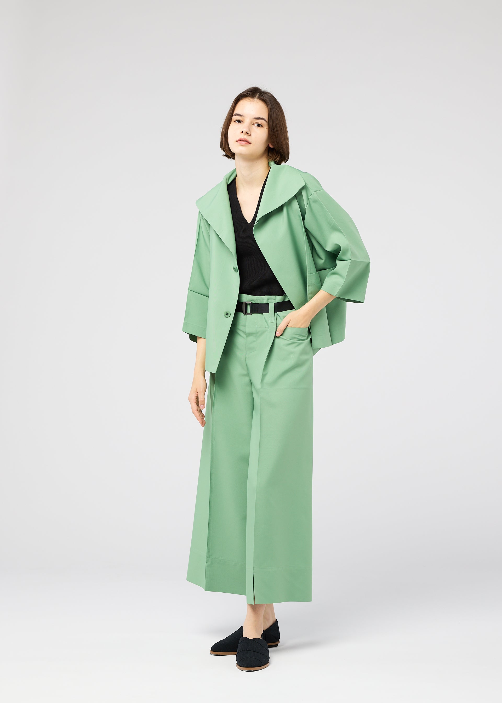 A model wears the 132 5. ISSEY MIYAKE 132 5. FLAT 2 132-5-flat-2-jacket-olive-green.