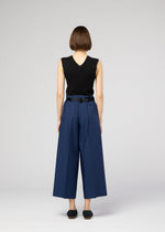 A model wears the 132 5. ISSEY MIYAKE 132 5. FLAT 2 132-5-flat-2-trousers-navy.