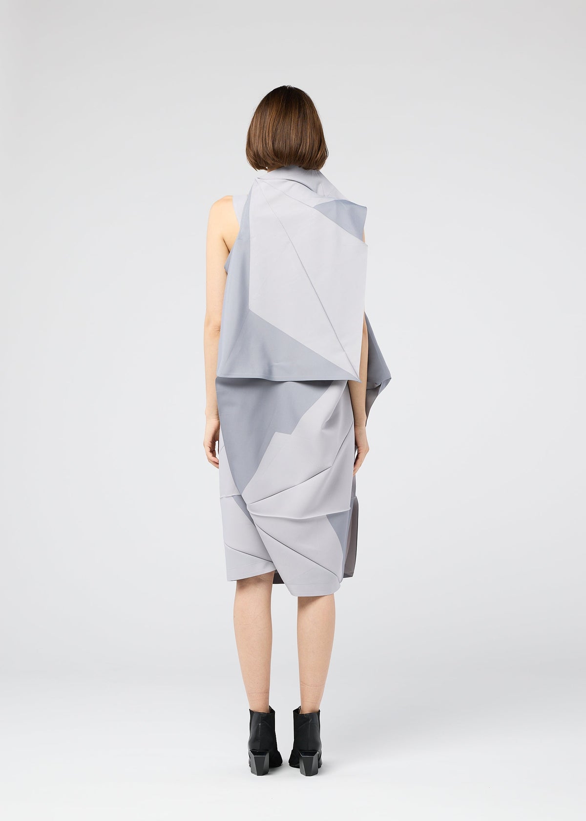 A model wears the 132 5. ISSEY MIYAKE NO.17 PRINT dress.