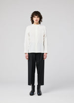 A model wears the 132 5. ISSEY MIYAKE FOLD SHIRT shirt.