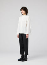 A model wears the 132 5. ISSEY MIYAKE FOLD SHIRT shirt.