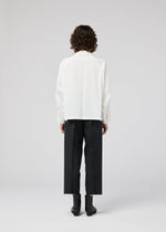 A model wears the 132 5. ISSEY MIYAKE FOLD SHIRT shirt.