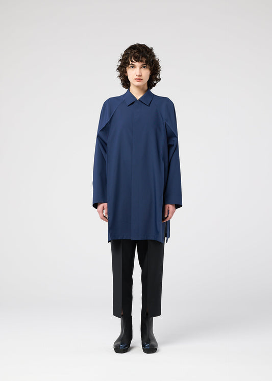 A model wears the 132 5. ISSEY MIYAKE FOLD SHIRT shirt.