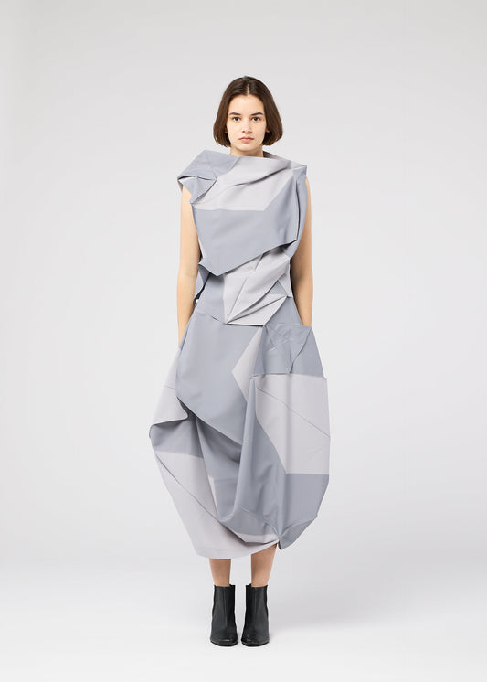 A model wears the 132 5. ISSEY MIYAKE NO.17 PRINT shirt.