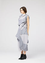 A model wears the 132 5. ISSEY MIYAKE NO.17 PRINT shirt.