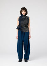 A model wears the 132 5. ISSEY MIYAKE FACET KNIT top.