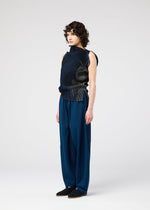 A model wears the 132 5. ISSEY MIYAKE FACET KNIT top.