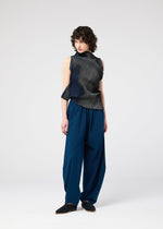 A model wears the 132 5. ISSEY MIYAKE FACET KNIT top.