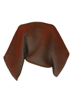 A detail shot of the 132 5. ISSEY MIYAKE FACET KNIT top.