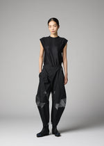 A model wears the 132 5. ISSEY MIYAKE F-BT f-bt-trousers-black-x-silver.