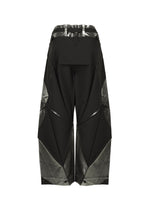 A detail shot of the 132 5. ISSEY MIYAKE F-BT trousers.