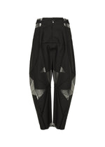 A detail shot of the 132 5. ISSEY MIYAKE F-BT trousers.