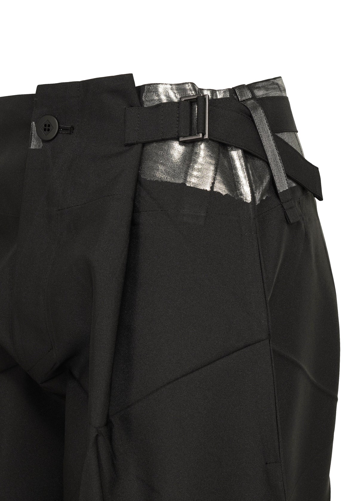A detail shot of the 132 5. ISSEY MIYAKE F-BT trousers.