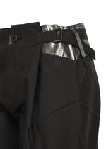 A detail shot of the 132 5. ISSEY MIYAKE F-BT trousers.