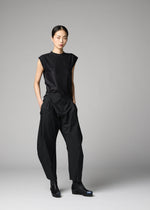 A model wears the 132 5. ISSEY MIYAKE F-BT f-bt-trousers-black.