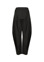 A detail shot of the 132 5. ISSEY MIYAKE F-BT trousers.