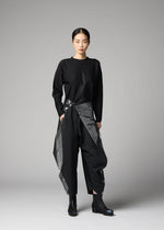 A model wears the 132 5. ISSEY MIYAKE F-BT f-bt-trousers-black-x-silver-1.