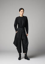 A model wears the 132 5. ISSEY MIYAKE F-BT f-bt-trousers-black-1.