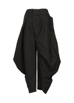 A detail shot of the 132 5. ISSEY MIYAKE F-BT trousers.