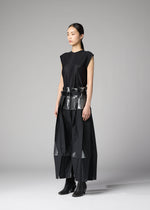 A model wears the 132 5. ISSEY MIYAKE No.3-1 no-3-1-trousers-black-x-silver.