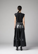 A model wears the 132 5. ISSEY MIYAKE No.3-1 no-3-1-trousers-black-x-silver.