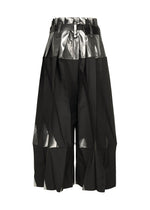 A detail shot of the 132 5. ISSEY MIYAKE No.3-1 trousers.