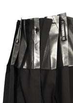 A detail shot of the 132 5. ISSEY MIYAKE No.3-1 trousers.
