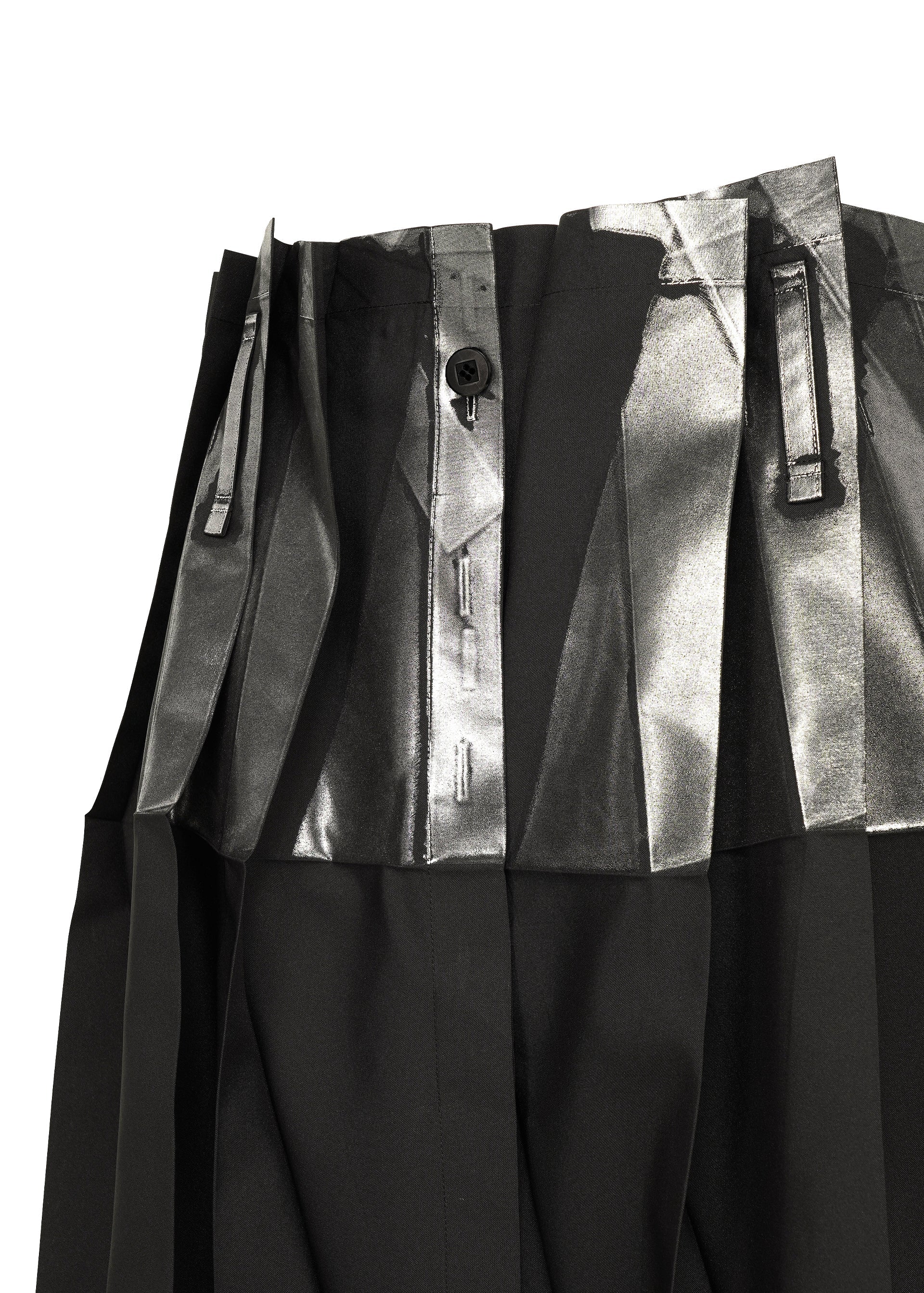 A detail shot of the 132 5. ISSEY MIYAKE No.3-1 trousers.