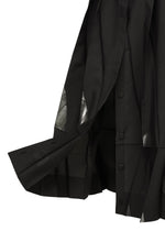A detail shot of the 132 5. ISSEY MIYAKE No.3-1 trousers.