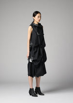 A model wears the 132 5. ISSEY MIYAKE No.1-1 no-1-1-dress-black-x-silver.