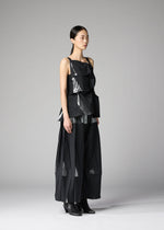 A model wears the 132 5. ISSEY MIYAKE No.1-1 shirt.
