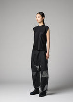 A model wears the 132 5. ISSEY MIYAKE F-KN f-kn-top-black.