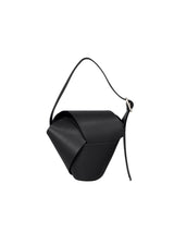 A product shot of the ISSEY MIYAKE BAND BIND BAG bag in black (15).