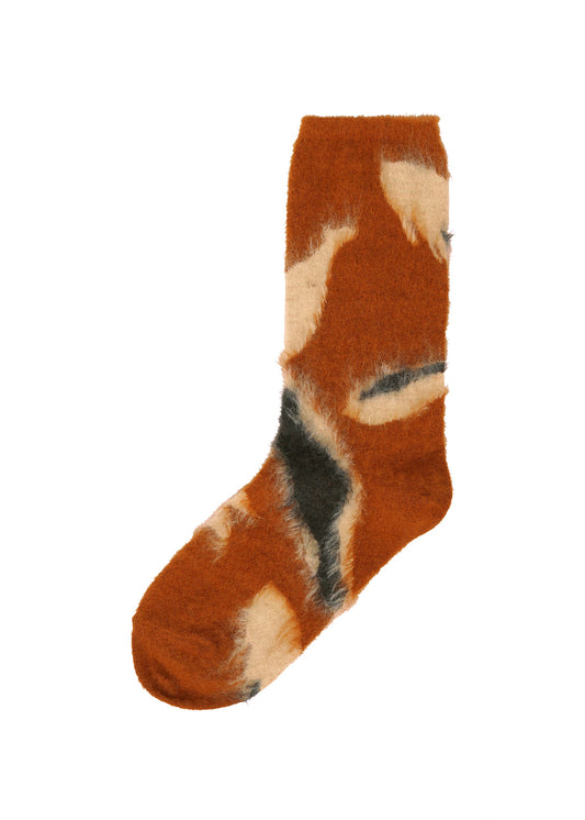 A product shot of the ISSEY MIYAKE VIGOR SOCKS socks in brown-hued (47).