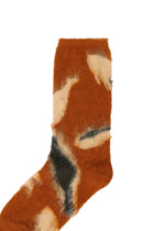 A detail shot of the ISSEY MIYAKE VIGOR SOCKS socks.