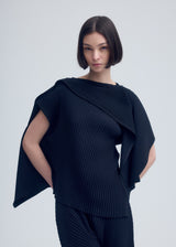 A model wears the ISSEY MIYAKE VIGOR PLEATS SOLID shirt.