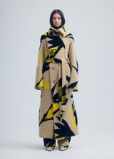 A model wears the ISSEY MIYAKE VIGOR coat.