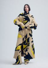 A model wears the ISSEY MIYAKE VIGOR coat.