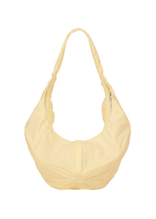 A product shot of the ISSEY MIYAKE PAPER BALLOON bag in pytalos yellow (50).