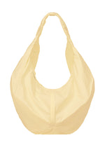 A product shot of the ISSEY MIYAKE PAPER BALLOON bag in pytalos yellow (50).