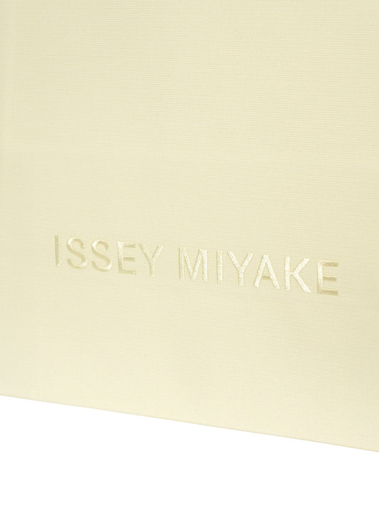 A detail shot of the ISSEY MIYAKE PAPER BAG bag.