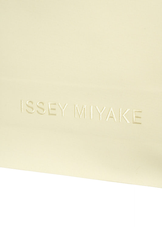 A detail shot of the ISSEY MIYAKE PAPER BAG bag.