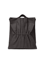 A product shot of the ISSEY MIYAKE DRAWN AND PRESSED bag in black (15).