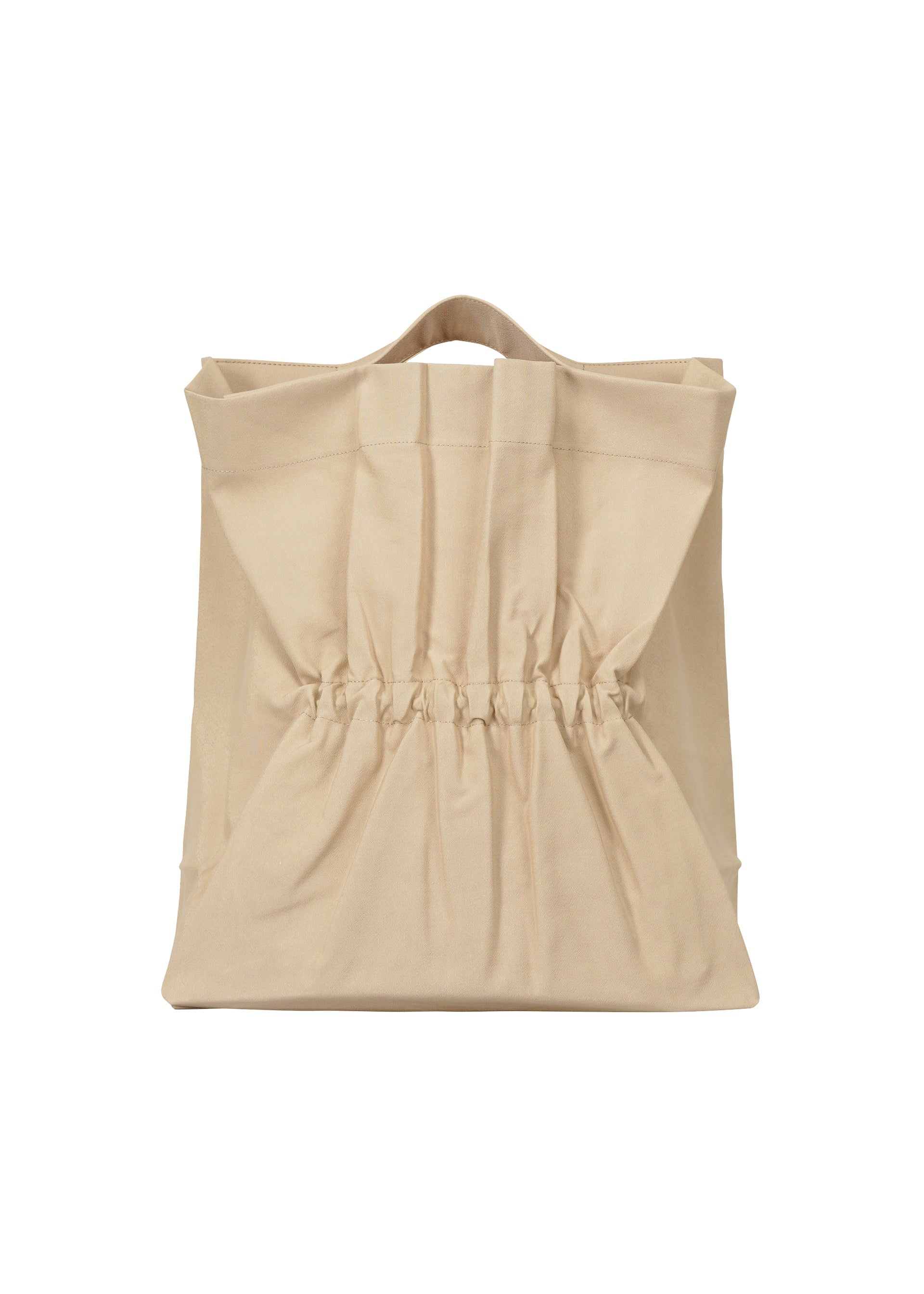 A product shot of the ISSEY MIYAKE DRAWN AND PRESSED bag in oaka beige (48).