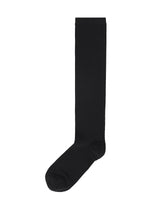 A product shot of the ISSEY MIYAKE SHEER SOCKS socks in black (15).
