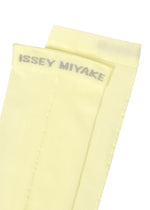 A detail shot of the ISSEY MIYAKE SHEER SOCKS socks.