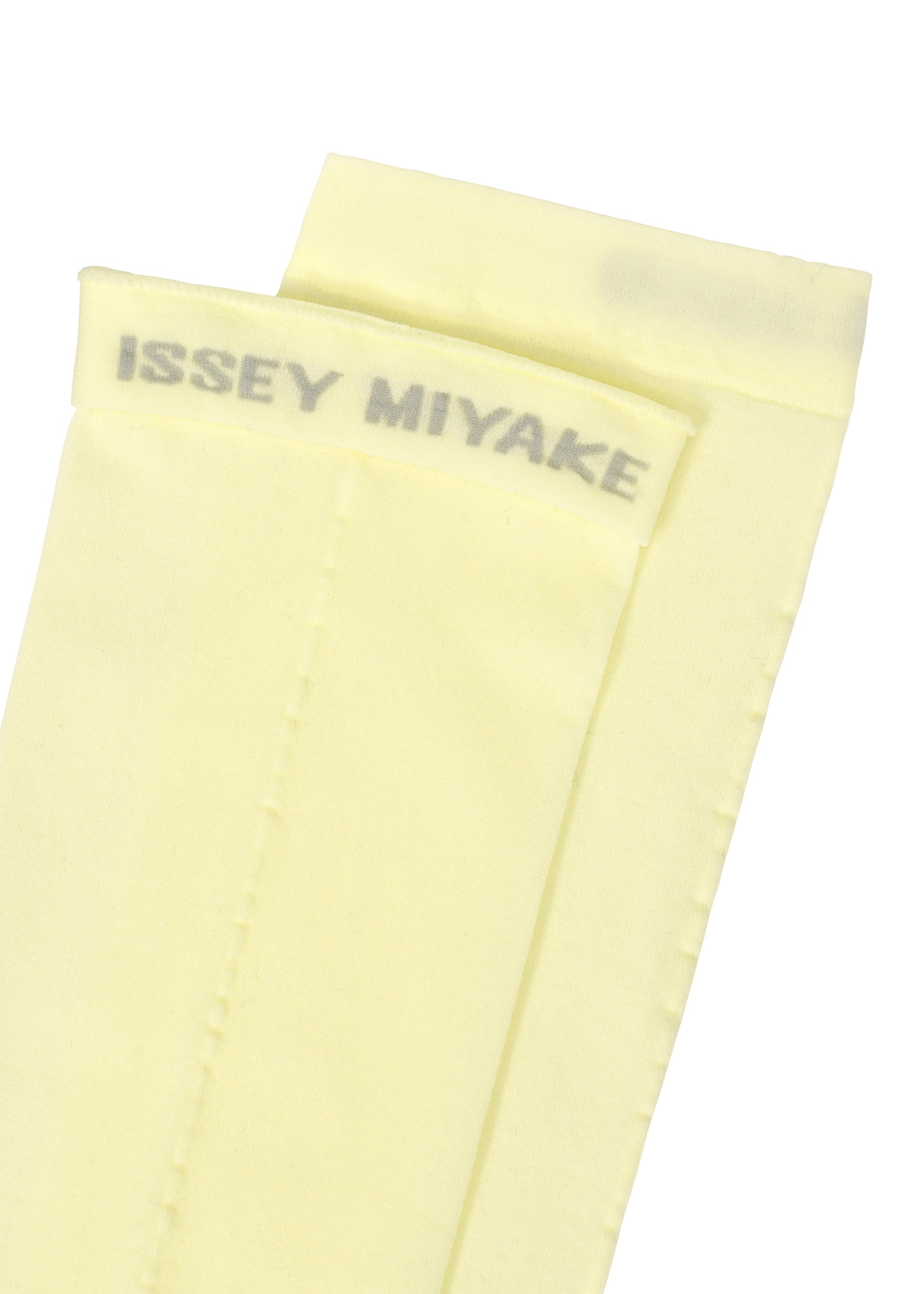 A detail shot of the ISSEY MIYAKE SHEER SOCKS socks.
