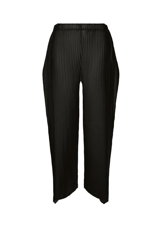 A product shot of the ISSEY MIYAKE SHADOW STUDY PLEATS SOLID trousers in .